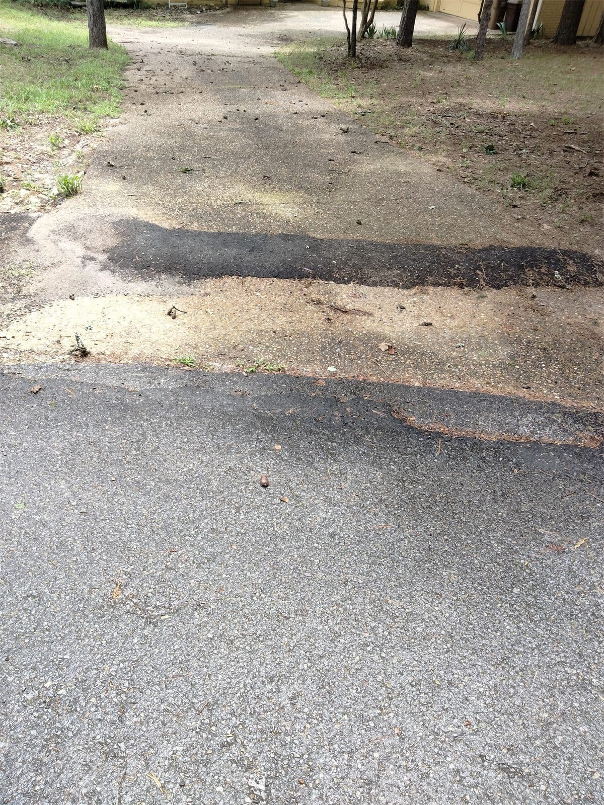 Dirty driveway before pressure washing